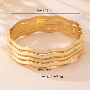 Set of 4 gold wavy bangles for women showing 7cm inner diameter and 60.2g weight