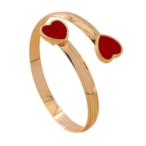 Elegant gold open bangle featuring two vibrant red enamel heart accents for women