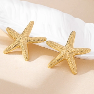 Elegant gold starfish stud earrings featuring realistic textured finish in a stylish pair