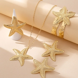 Parure de bijoux étoile de mer dorée avec bague, collier, bracelet et boucles d'oreilles