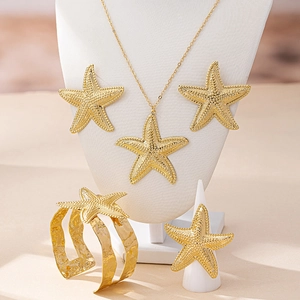 Parure de bijoux étoile de mer dorée élégante avec collier boucles bracelet et bague