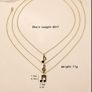 Lot de 3 colliers dorés avec pendentifs notes de musique en émail noir chic
