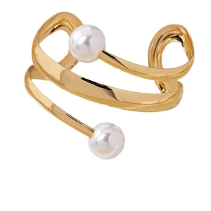 Minimalist double-layered gold spiral ring with two white pearls on a white background