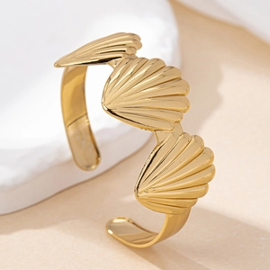 Minimalist gold shell open bangle with three scallop details for elegant ocean-style fashion