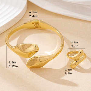 Polished gold minimalist snake shape open ring and hinged bangle jewelry set