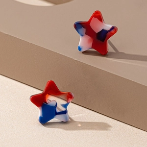 Minimalist red white and blue marble pattern star stud earrings on display stand