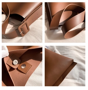 Detailed close-up of brown leather tote bag with square buckle and matte texture