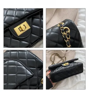 Detail view of black quilted crossbody bag showing gold twist lock and chain strap