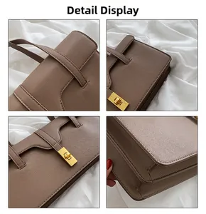 Detail view of brown crossgrain leather texture and golden metal twist lock closure