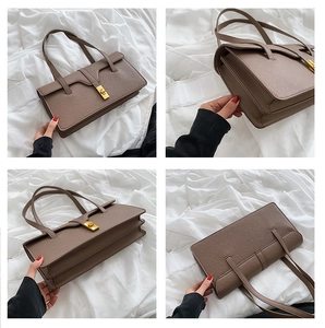 Detailed views of brown retro shoulder bag with litchi grain and gold rotating lock