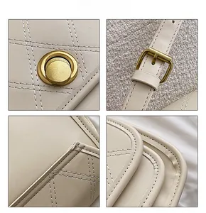 Detail view of cream leather crossbody bag with quilted pattern and golden rotary lock