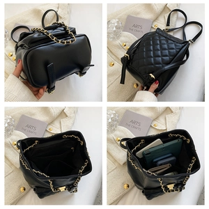 Detailed views of black quilted leather backpack with gold chain and spacious interior