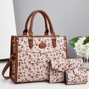 Ensemble de sacs trois pièces avec imprimé cerise, garniture en cuir brun et dorure