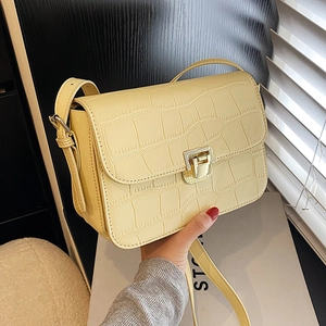 Lemon yellow crocodile pattern square crossbody bag with gold metallic buckle and strap