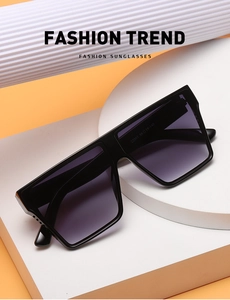 Macro view of matte black oversized sunglasses frame with printed temple model parameters