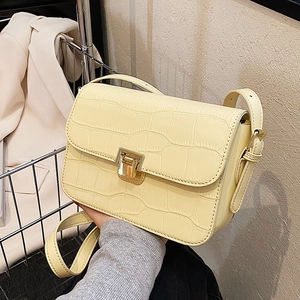 Chic cream crocodile pattern crossbody square bag with elegant gold metal flip lock