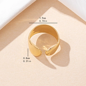 Minimalist wide gold-plated open ring with a polished metallic finish and adjustable band