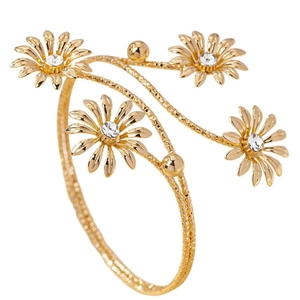 Elegant gold flower cuff bracelet with sparkling crystal centers and woven textured band