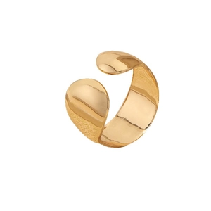 Minimalist wide gold open ring with a polished curved surface and high glossy finish