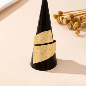Minimalist open gold ring with frosted texture on a cone display stand for daily wear
