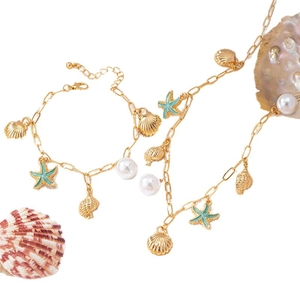 Starfish shell charm jewelry set with gold necklace and bracelet for summer beach style