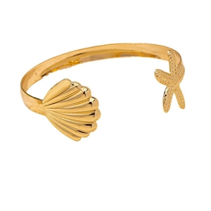 Gold starfish and seashell open cuff bracelet for a beach vacation jewelry style