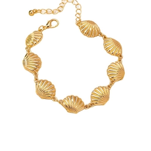 Golden seashell bracelet with textured fan motifs and adjustable lobster clasp closure