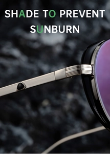 Macro detail of silver brushed metal temples and purple lenses on oval sunglasses