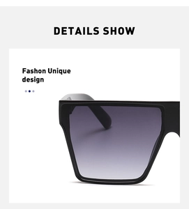 Detail showing oversized square frames and purple gradient lenses of these sunglasses