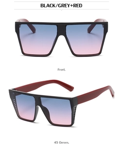 Macro view of square oversized sunglasses with maroon temples and blue pink gradient lenses