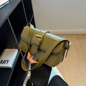 Olive green vintage shoulder bag with golden buckle and rectangular minimalist design