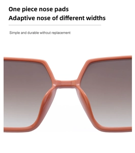 Detail of orange TR90 frame sunglasses showing one-piece nose pads for comfort