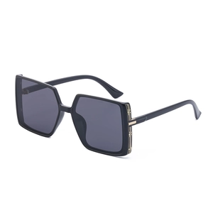 Classic black TR square frame sunglasses with gold metal accents shown in a 45-degree angle