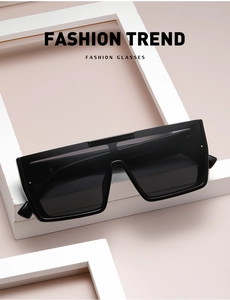 Detail view of square oversized sunglasses showing frame model 8837 on the inner temple