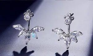 Macro shot of silver drop earrings featuring marquise-cut AAA cubic zirconia stones