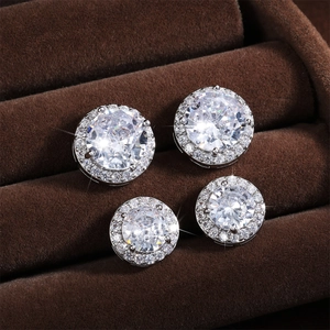 Set of minimalist silver round halo stud earrings with sparkling AAA cubic zirconia crystals
