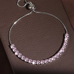 Bracciale tennis regolabile in argento con zirconi rosa su fondo in pelle scura