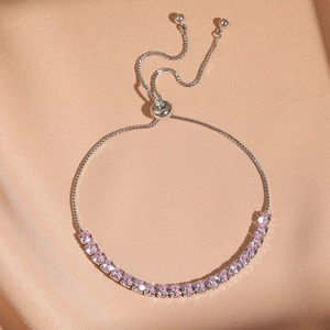 Bracciale regolabile argento con cristalli rosa da 4mm su seta color champagne