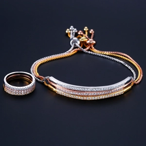 Close-up of adjustable bolo bracelet and three-row ring set with pavé AAA cubic zirconia