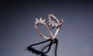 Detailed macro shot of rose gold wrap ring featuring marquise-cut zircon crown design
