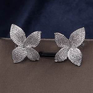 Sparkling silver flower stud earrings with pave zircon petals for an elegant look