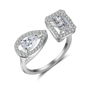 Silver geometric open ring with pear and rectangle-cut halo cubic zirconia stones