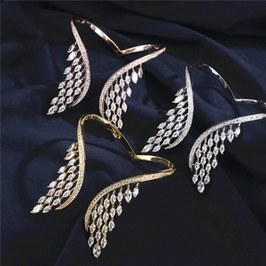 Bracelets ouverts en forme de plume en or, argent et or rose avec zircons marquise