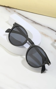 Detail of vintage sunglasses hinge with silver accents and DB1038 model number