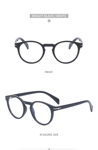 Detailed front and side view of oval sunglasses in bright black and white two-tone finish