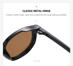 Detailed macro view of durable metal hinge on classic black round frame sunglasses
