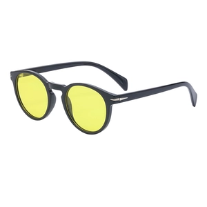 Vintage round black frame sunglasses with yellow lenses and silver arrow detail