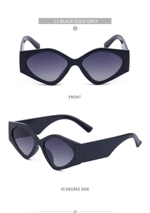 Detail view of geometric black and gold sunglasses with gradient grey lenses from two angles