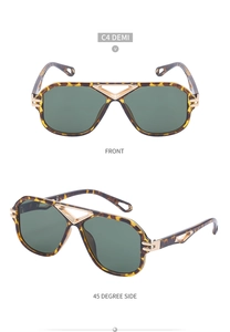 Detail of demi retro steampunk sunglasses with gold metal double bridge and dark lenses