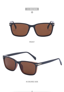 Close-up of square frame sunglasses with golden hinge detail and brown tinted lenses